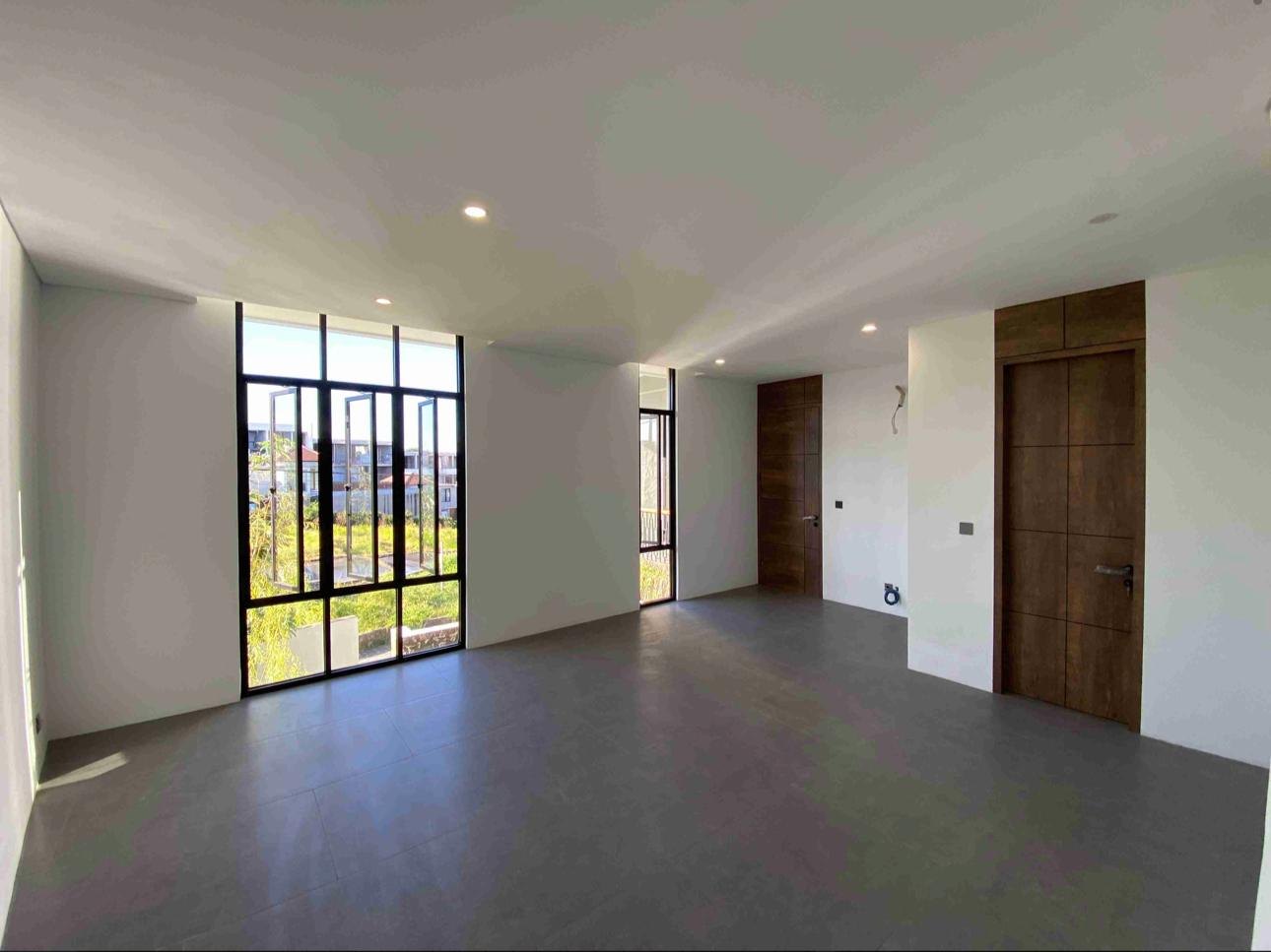 Bedroom glass door at We Villa Cemagi